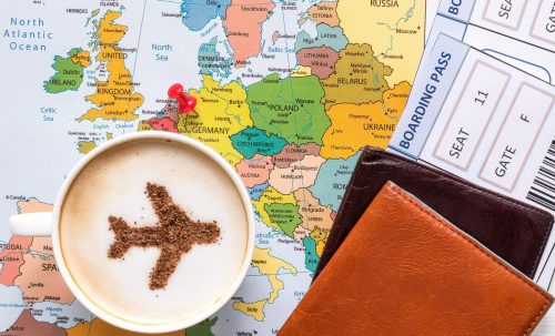 Airplane,Made,Of,Cinnamon,In,Cappuccino,,Passports,,Europe,Map,And